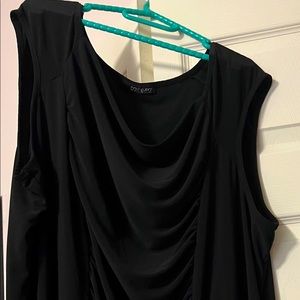 Black sleeveless blouse with a cowl neckline and ruching down the centre